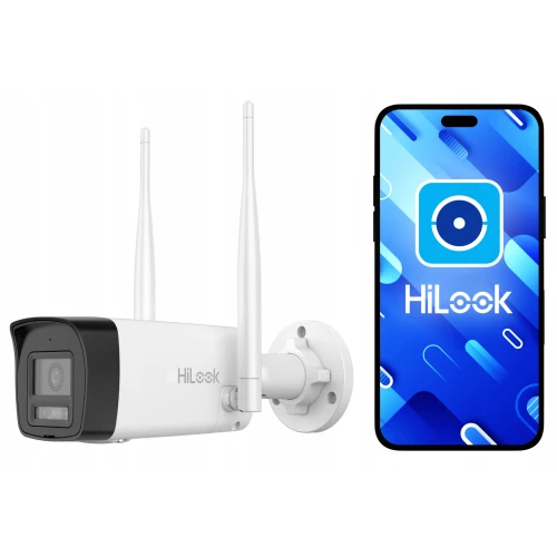 Bezprzewodowa kamera Wi-Fi HiLook z dwoma antenami zamontowana na ścianie. Obok kamery znajduje się smartfon z logo HiLook na ekranie.