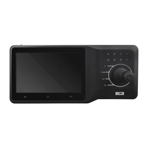 Na zdjęciu znajduje się czarna klawiatura sterująca BCS DVR z dużym ekranem dotykowym po lewej stronie i zestawem przycisków oraz joystickiem po prawej. Urządzenie ma nowoczesny design i jest przeznaczone do zarządzania systemami monitoringu.