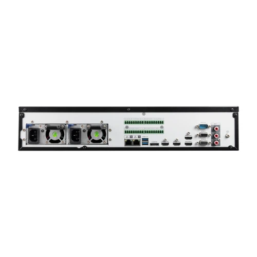 Zdjęcie przedstawia tylny panel rejestratora IP BCS z różnorodnymi portami i złączami, w tym złączami zasilania, portami USB, HDMI, VGA oraz audio. Widoczne są również wentylatory chłodzące oraz złącza sieciowe i alarmowe.