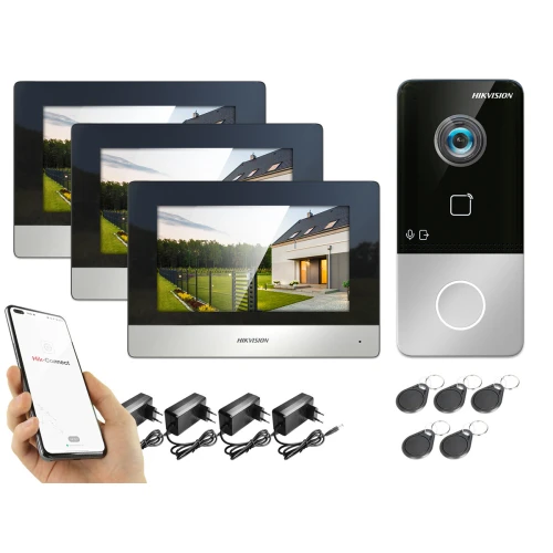 Zestaw wideodomofonowy Hikvision DS-KIS603-P-T składa się z trzech monitorów, panelu z kamerą oraz akcesoriów takich jak zasilacze i breloki zbliżeniowe. Produkt umożliwia zdalne zarządzanie dostępem do posesji za pomocą aplikacji na smartfonie.