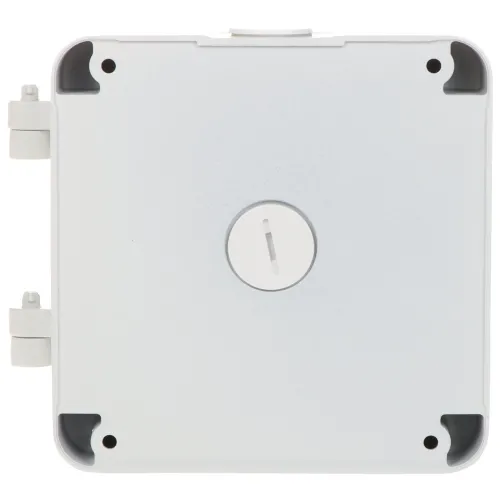 Kwadratowa, biała obudowa z tworzywa sztucznego z centralnym otworem i czarnymi narożnikami. Po lewej stronie widoczne są dwa uchwyty montażowe.