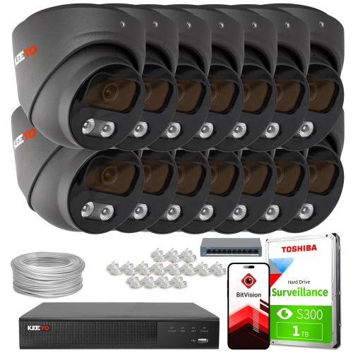 Zestaw do monitoringu IP składający się z dziesięciu kamer, rejestratora, dysku twardego Toshiba 1 TB, przełącznika sieciowego, przewodów oraz złączek. Kamery mają czarną obudowę i są oznaczone logo KEEYO.